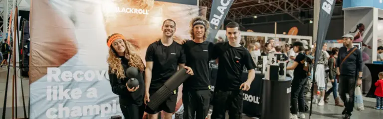 Blackroll team presenting fitness recovery products at an expo